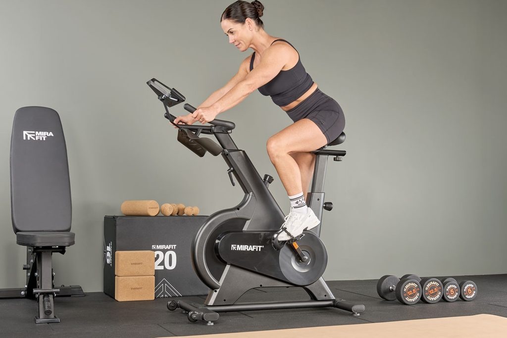 Athlete on a Mirafit Exercise Bike in a gym