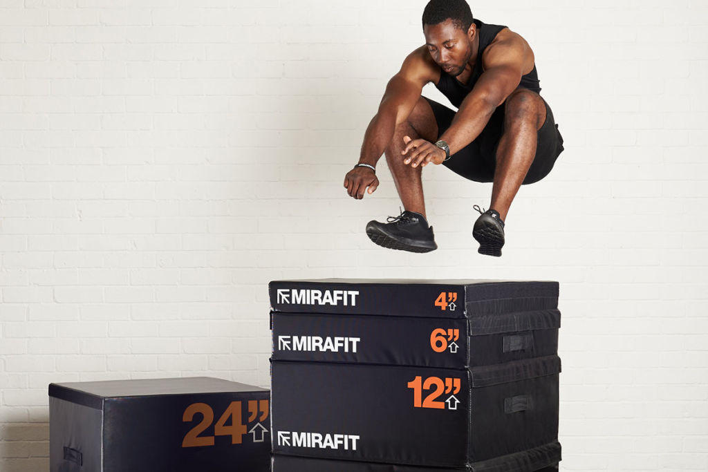 Mirafit Soft Stackable Plyo Boxes Man jumping onto Mirafit Soft Stackable Plyo Boxes