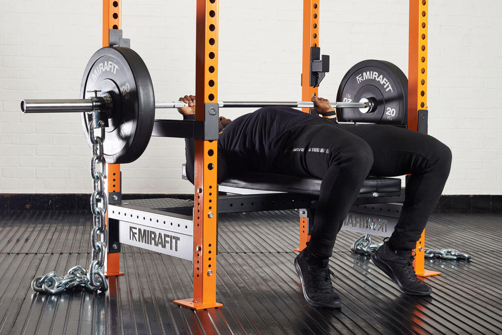 Mirafit Olympic Barbell Weighted Chains Man bench pressing with Mirafit Olympic Barbell Weighted Chains